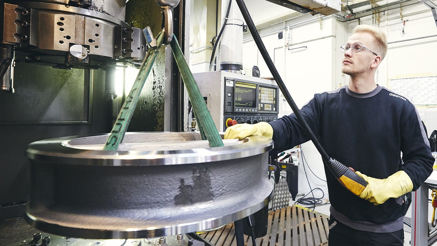 Engineer with PPE working on equipment